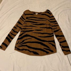 Size 2 Chicos animal print sweater worn once. Excellent condition.